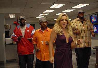 Still of 30 Rock's Ep 210 with Kevin 'Dot Com' Brown, Tracy Morgan, Jane Krakowski and Grizz Chapman dancing to the tune of Gladys Knight's hit 'Midnight Train to Georgia'.