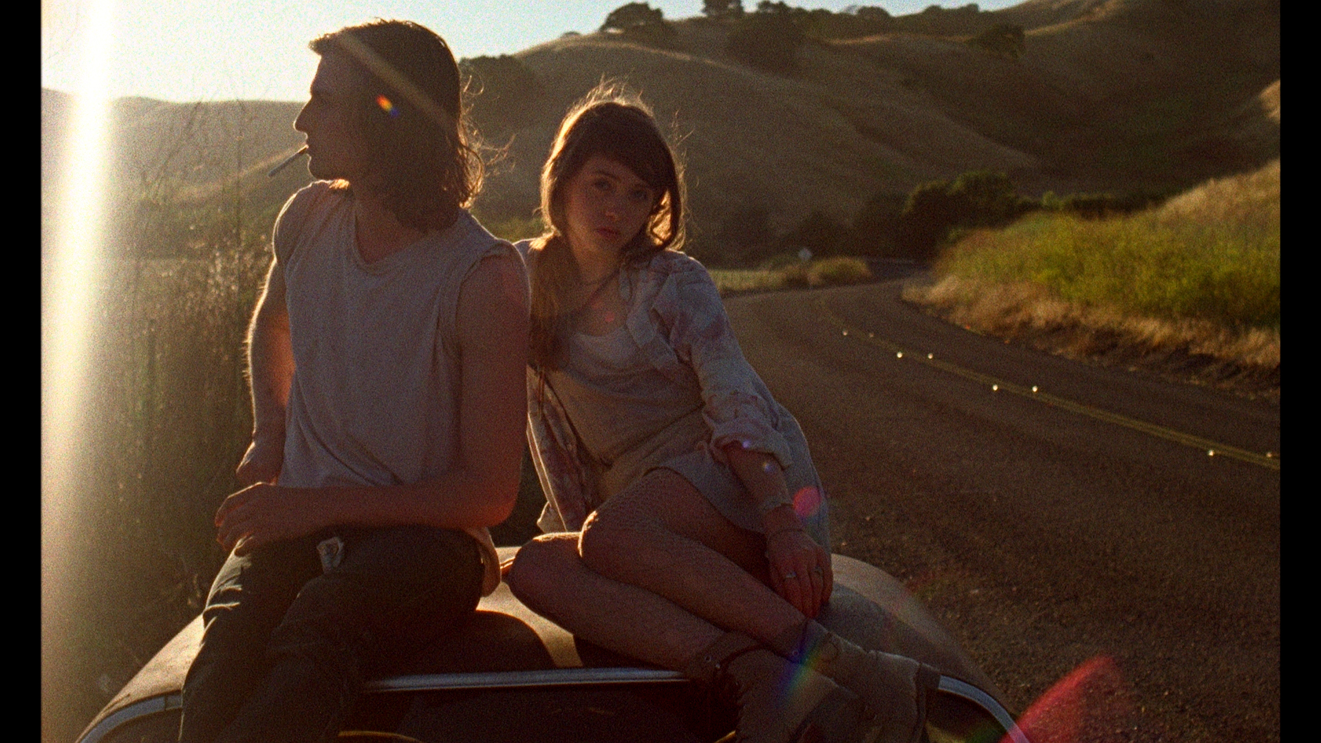 Still of Peter Vack and Natalia Dyer in I Believe in Unicorns (2014)