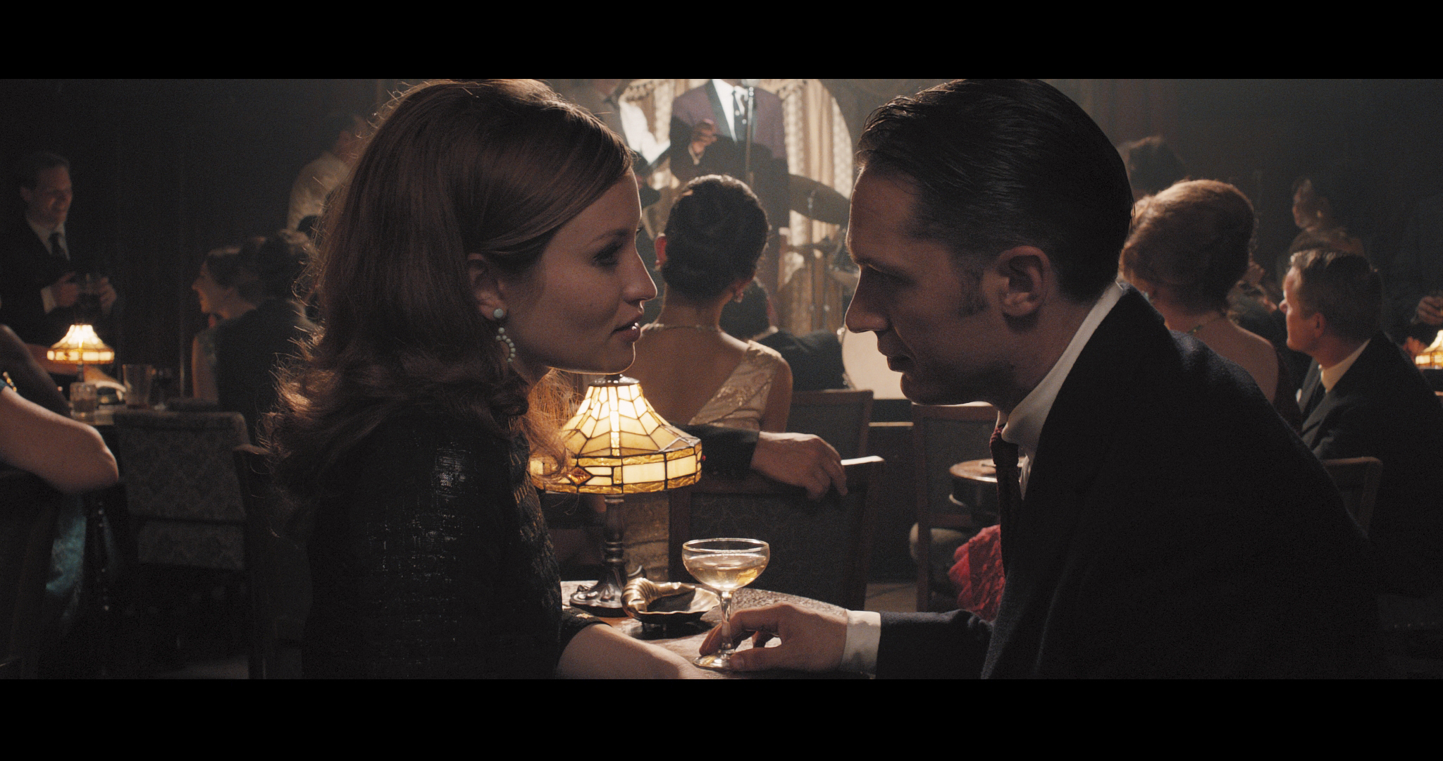 Still of Emily Browning and Tom Hardy in Legend (2015)