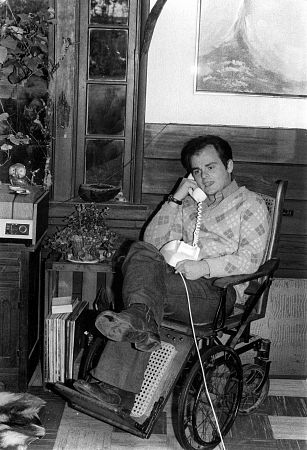 Gary Burghoff at home in an antique wheelchair C. 1973