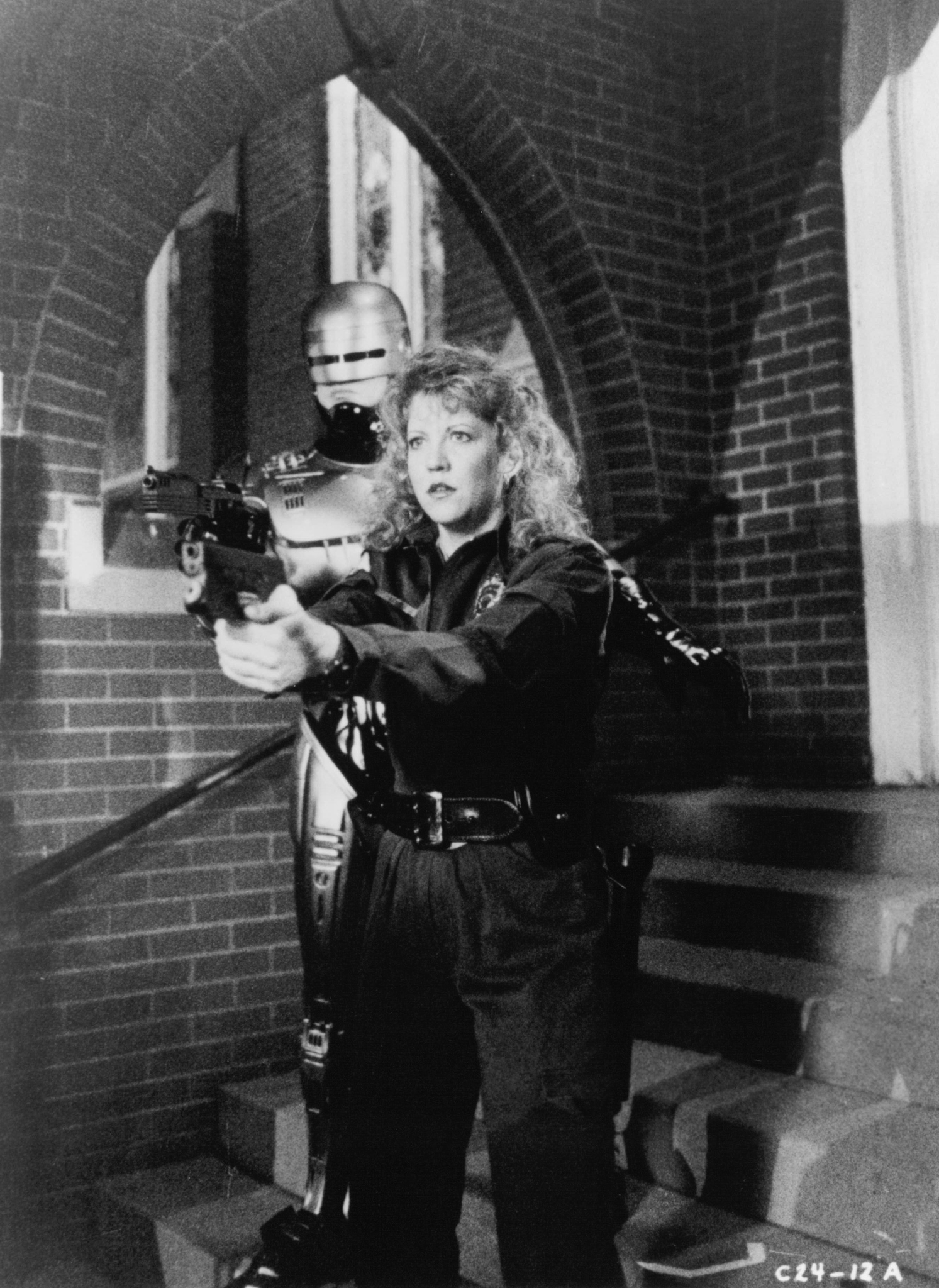 Still of Nancy Allen and Robert John Burke in RoboCop 3 (1993)