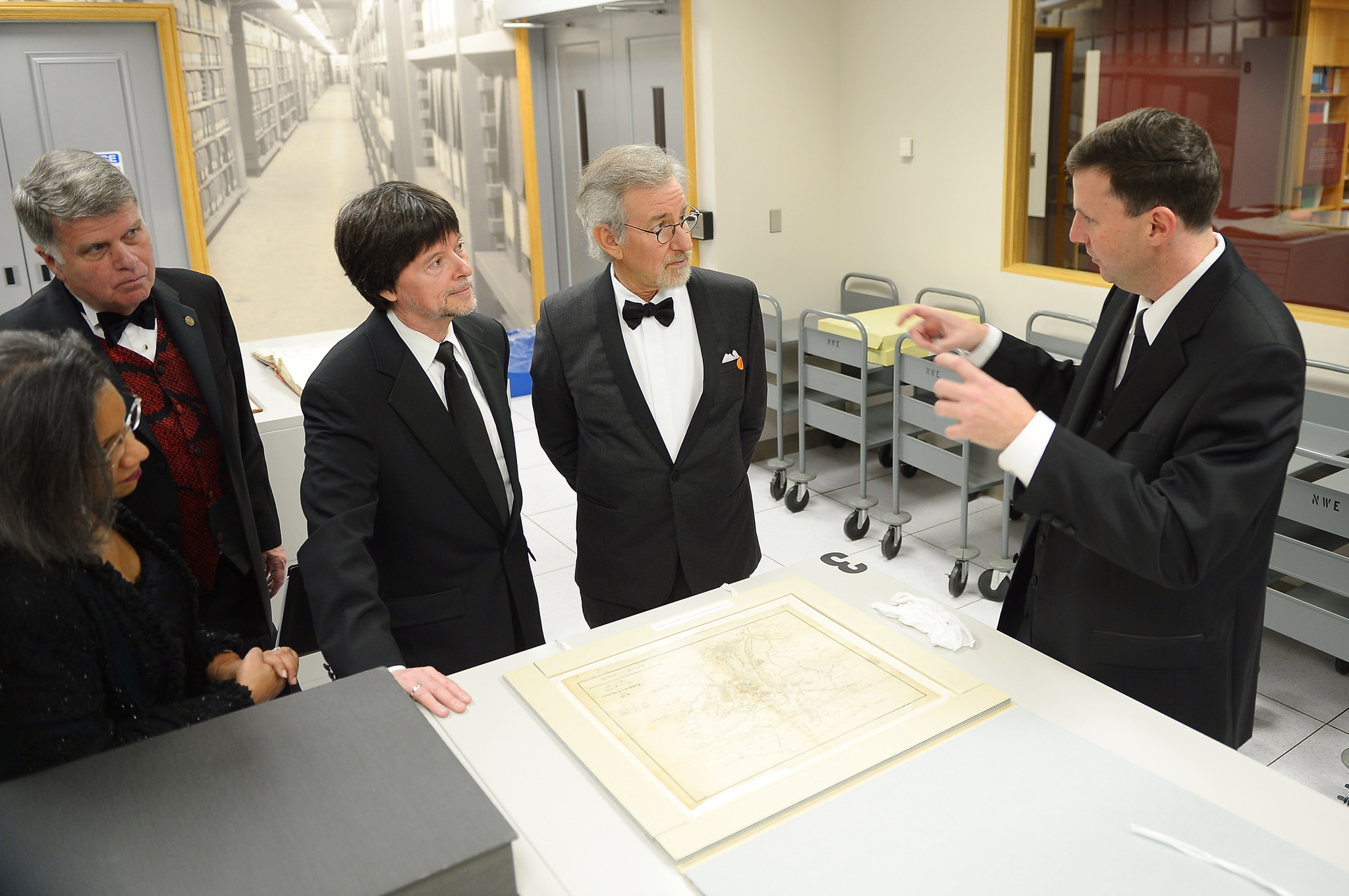 Foundation for the National Archives Chair and President A'Lelia Bundles, Archivist of the United States The Honorable David S. Ferriero, Foundation for the National Archives Board Vice President and Gala Chair Ken Burns, filmmaker and honoree Steven Spielberg, and archivist Trevor Plante view the 13th Amendment to the Constitution at the Foundation for the National Archives 2013 Records of Achievement award ceremony and gala in honor of Steven Spielberg on November 19, 2013 in Washington, D.C.