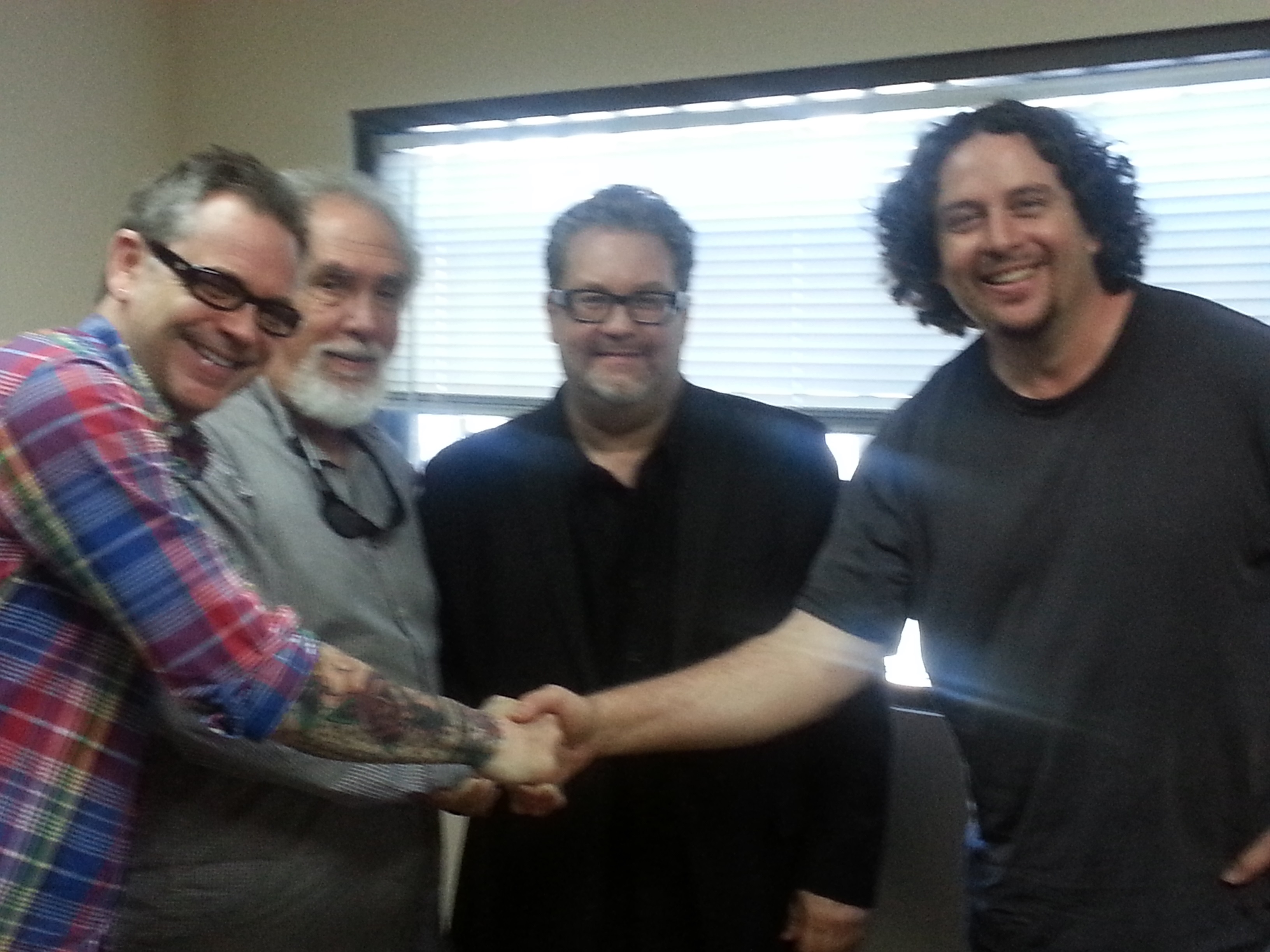 With Chip Fraser, Craig Albrecht and Rick Spalla, making a deal on The Treasure of Pirartes Cove, 2013