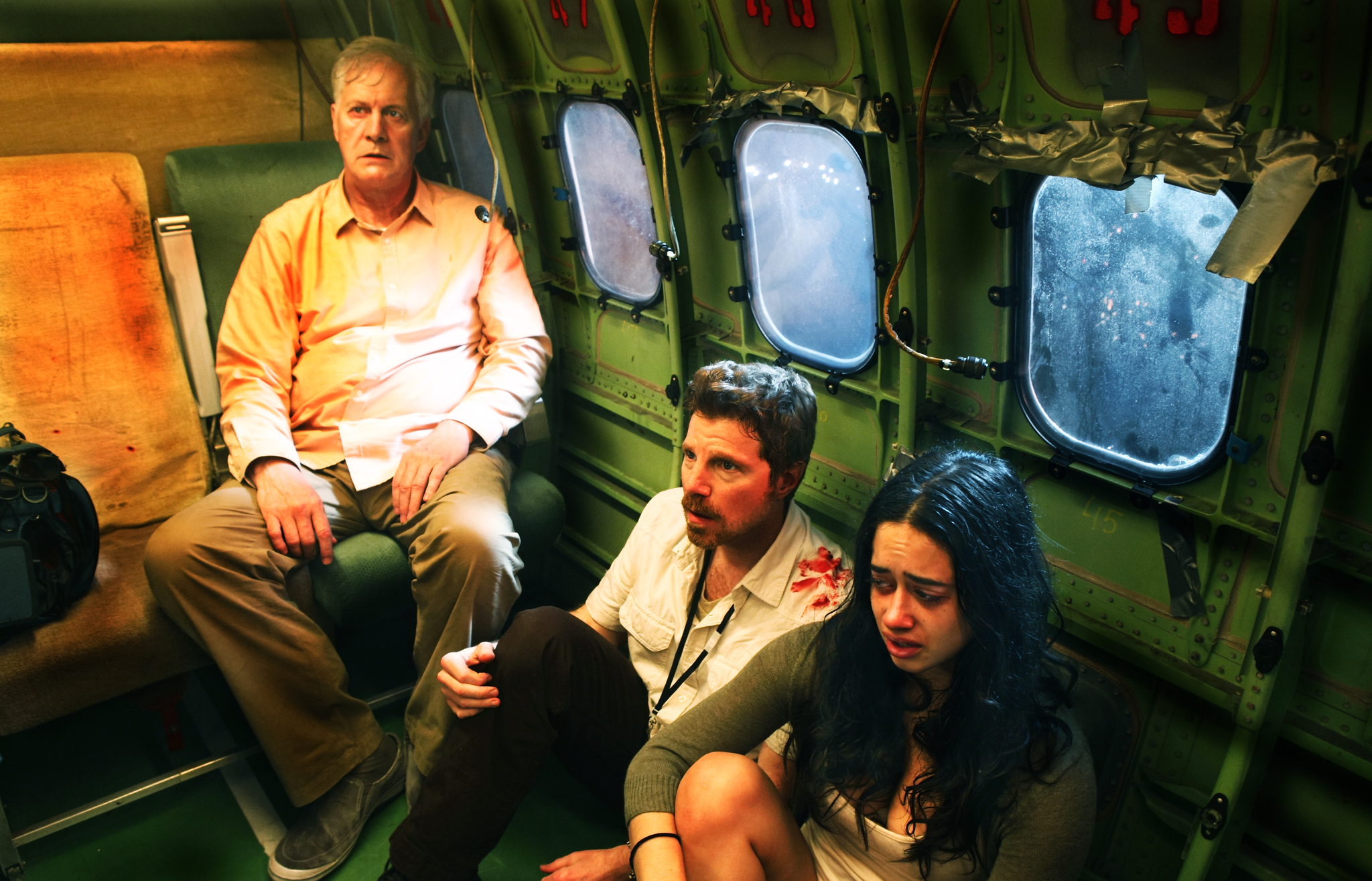 Still of Greg Callahan and Jeanine Mason in Default (2014)