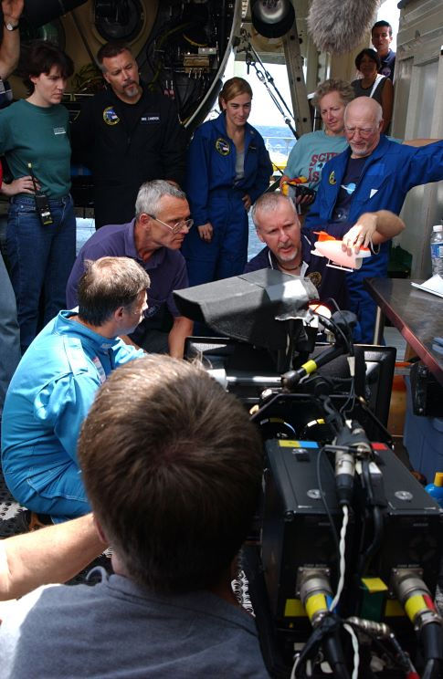 Center Row (L-R): Genya Chernaiev (MIR 1 Pilot), Victor Nischeta (MIR 2 Pilot), James Cameron (Director/Producer) - Top Row (L-R): Dr. Maya Tolstoy (Marine Seismologist - Lamont-Doherty Earth Observatory of Columbia University), Mike Cameron (ROV Creator & Pilot), Loretta Hidalgo (Space Generation Foundation President), Dr. Pamela 