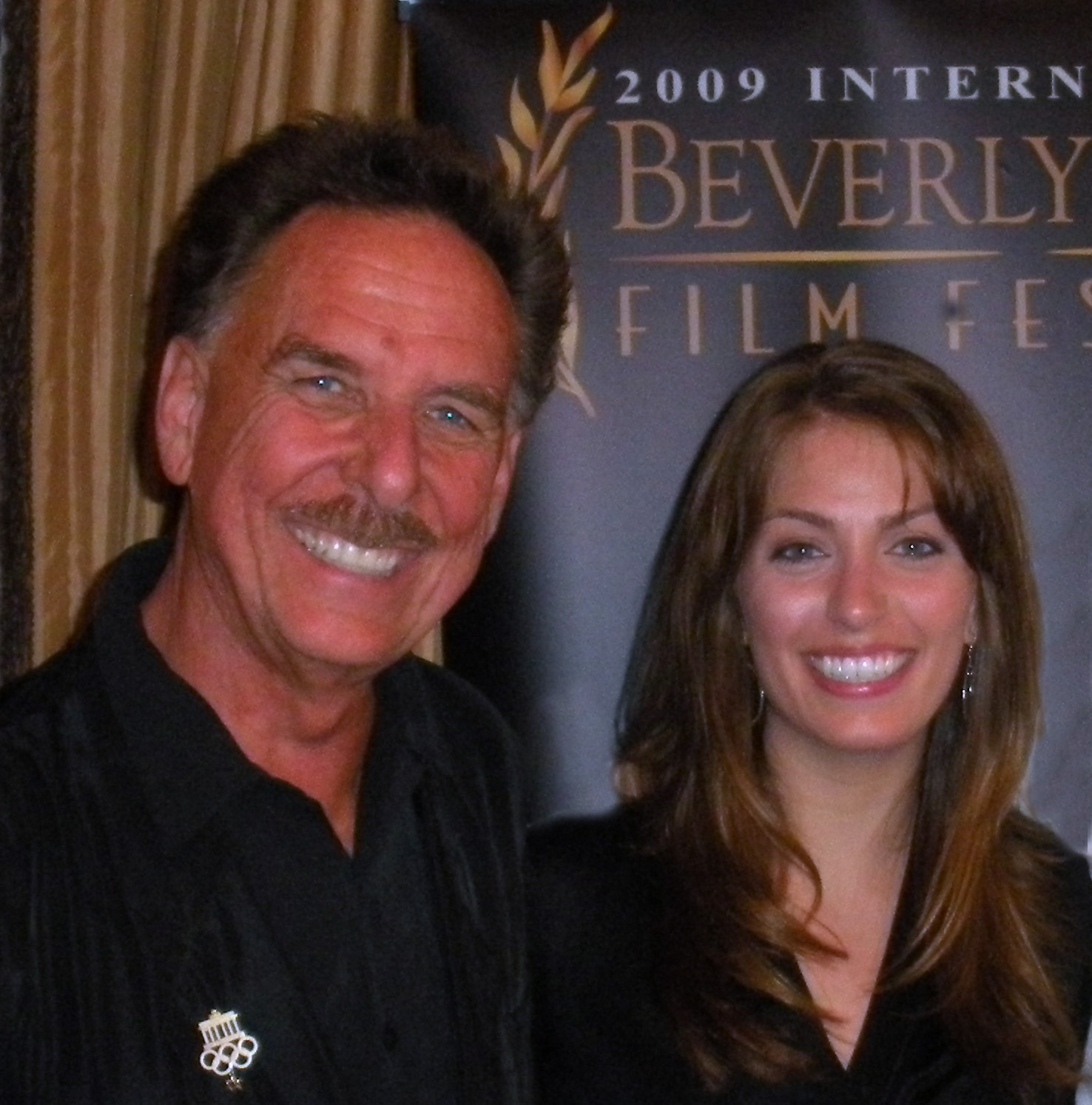 Christopher Canole receiving 2009 Beverly Hills International Film Festival nomination for best screenplay with actress and online host Leah D'Emilio