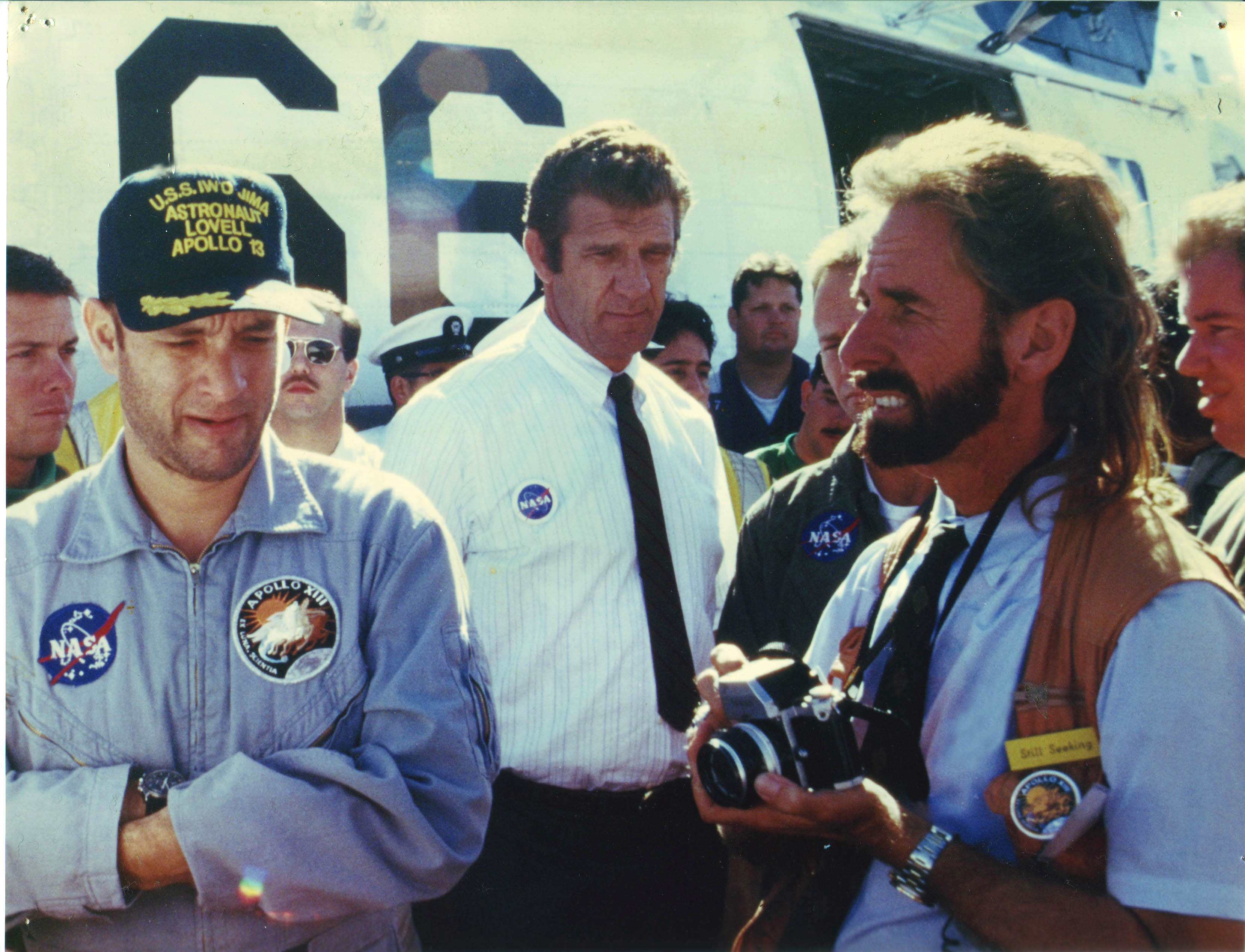 Chris Canole as NASA recovery team photographer with Tom Hanks in Apollo 13