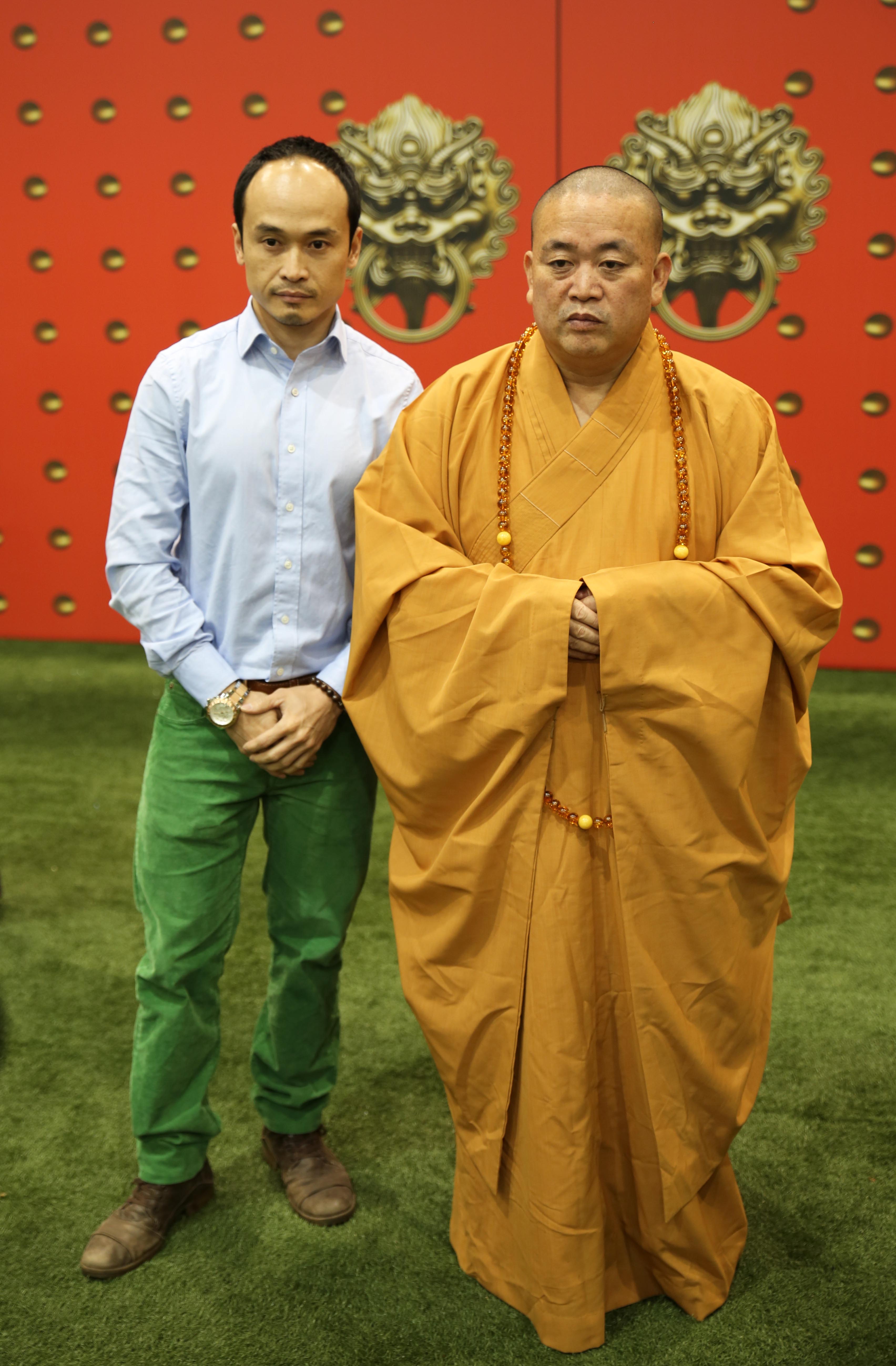 Still of Jason Ninh Cao with the Shaolin Abbot Shi Yong Xin at the Shaolin Cultural Festival in London.