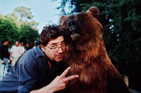 Director Steve Carr with star Archie the Bear on the set of 