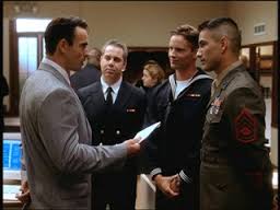 Chuck and 'JAG' castmates on set