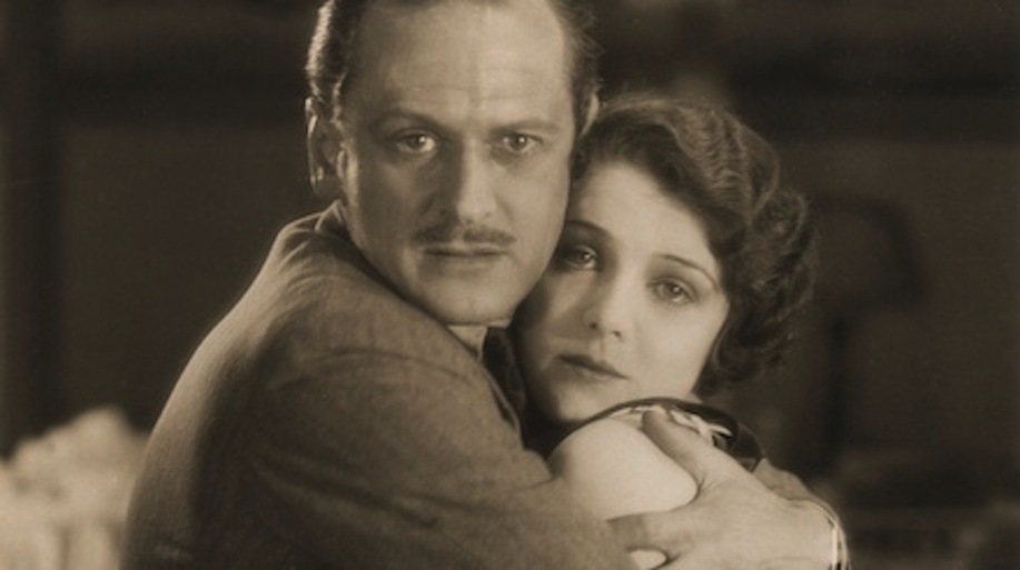 Still of Madeleine Carroll and Miles Mander in The First Born (1928)
