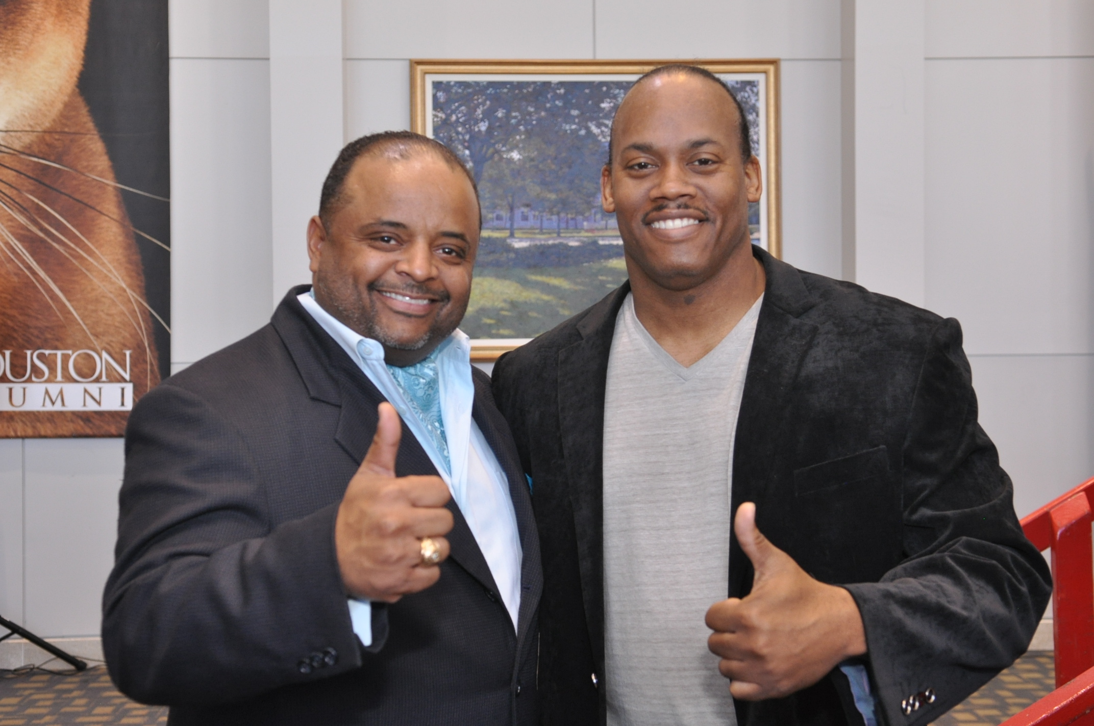 Producer Greg Carter and CNN analyst Roland Martin at NBA Legends game, All Star Weekend 2013, Houston,Texas.