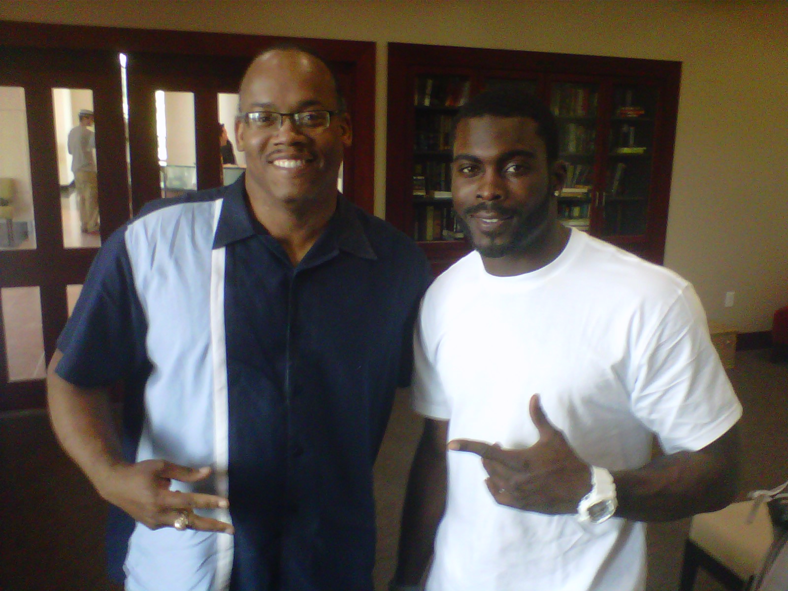 Producer/Director Greg Carter and Philadelphia Eagles star quarterback Michael Vick. Wrapping up a production meeting for the feature documentary, Michael Vick: Giving Back