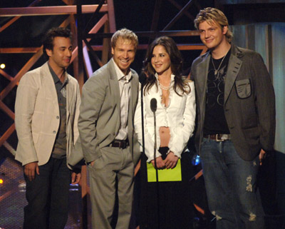 Nick Carter, Howie Dorough, Brian Littrell and Kelly Monaco