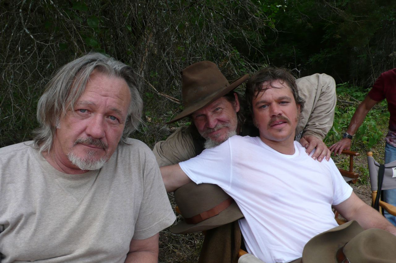 Loyd Catlett, Matt Damon and Jeff Bridges during the filming of True Grit 2010