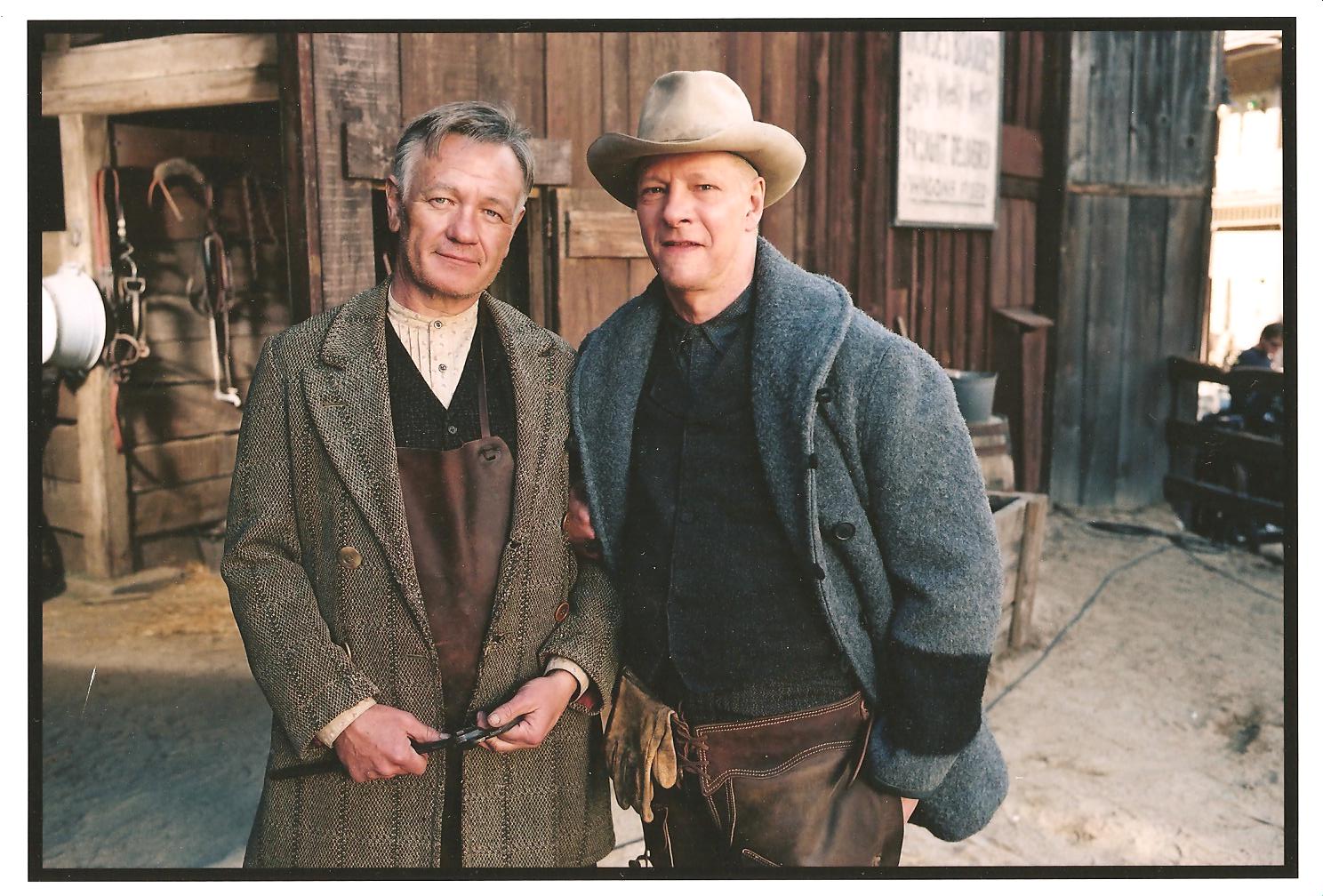 Playing the role of The Blacksmith in Seabiscuit with Chris Cooper, a break between takes. 2002