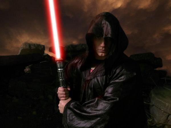 Director Zack Snyder tweeted this photo of Henry Cavill as Super Jedi with a lightsaber.