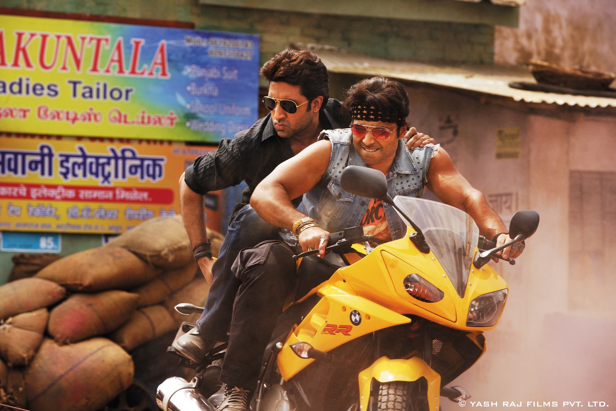 Still of Abhishek Bachchan and Uday Chopra in Dhoom:3 (2013)