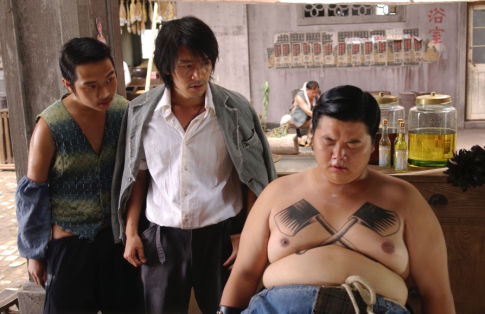 Center: Stephen Chow as Sing; Right: Lam Tze Chung as Sidekick