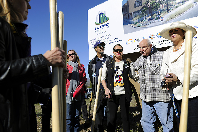 Krystee Clark and other members of Sunland-Tujunga Neighborhood Council gather for a picture at a groundbreaking ceremony for the Day Street Apartments in Sunland-Tujunga, Monday, January 14, 2013. The Day Street Apartments are a 46-unit development for homeless adults with mental illness.