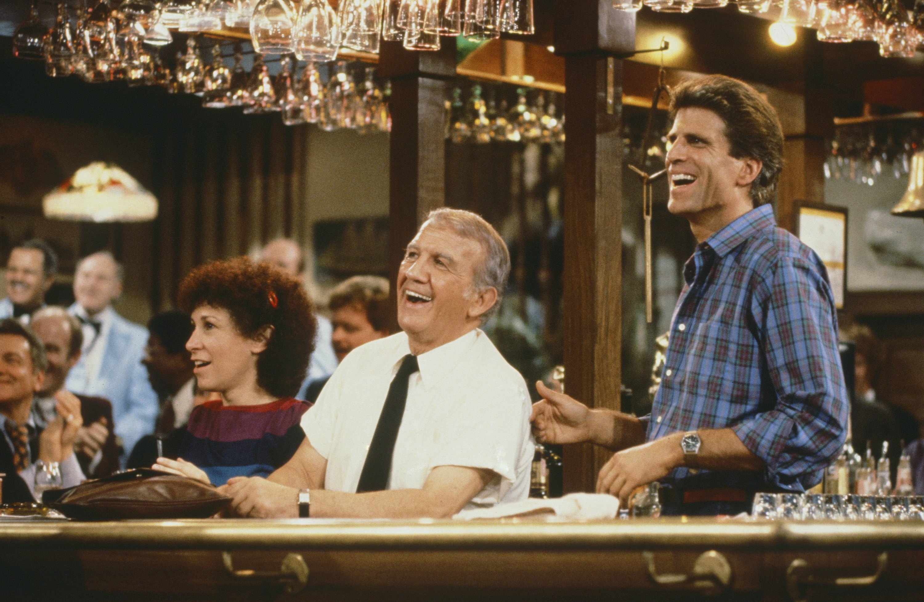 Still of John Cleese, Ted Danson, Nicholas Colasanto and Rhea Perlman in Cheers (1982)