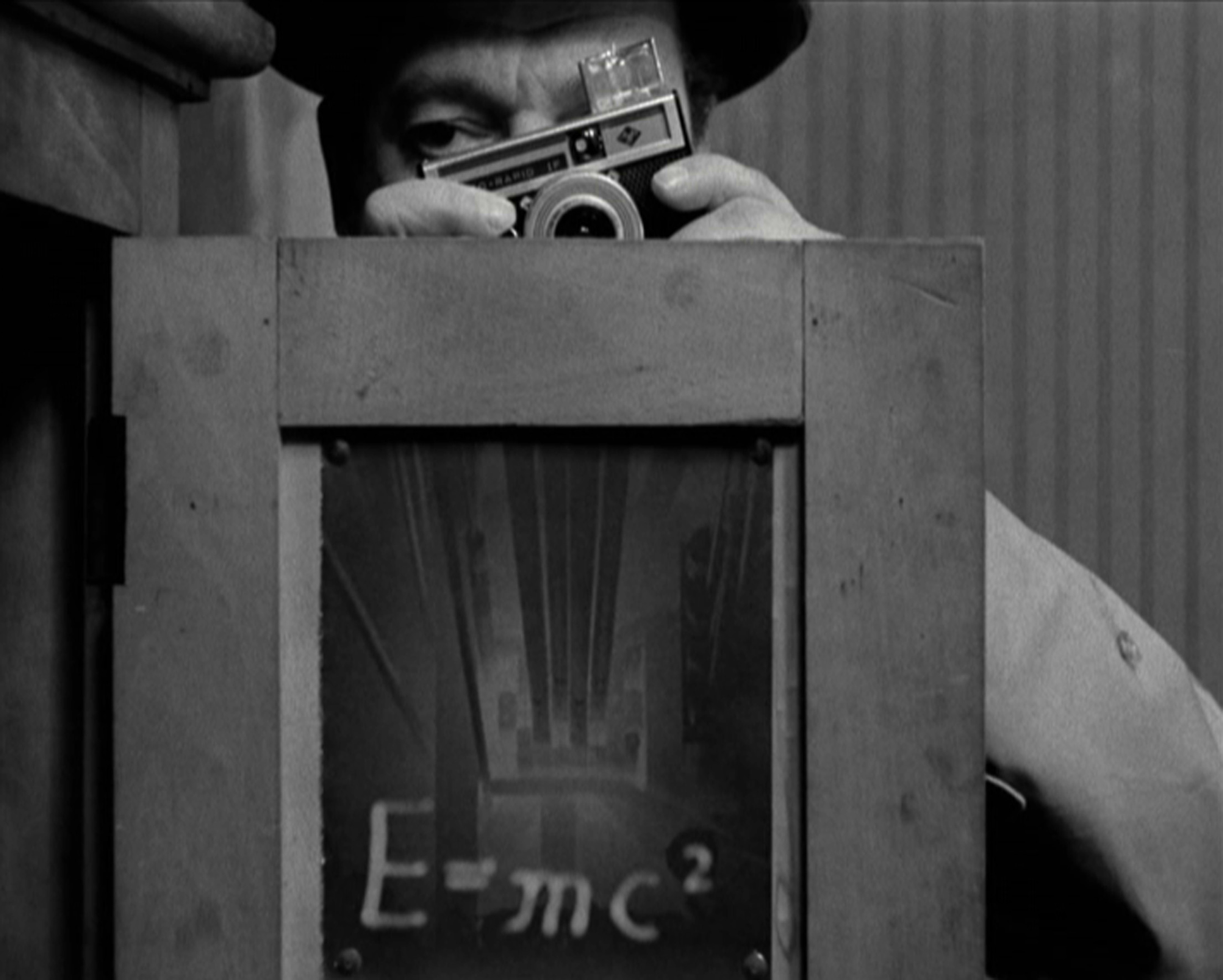 Still of Eddie Constantine in Alphaville, une étrange aventure de Lemmy Caution (1965)