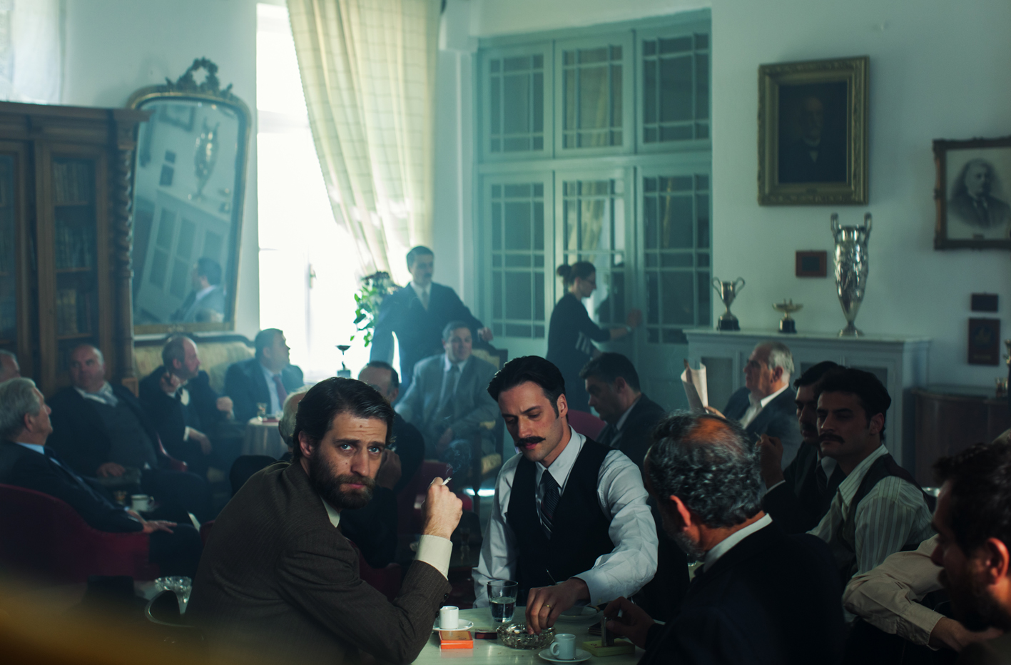 Still of Andreas Konstantinou and Maximos Moumouris in Mikra Anglia (2013)