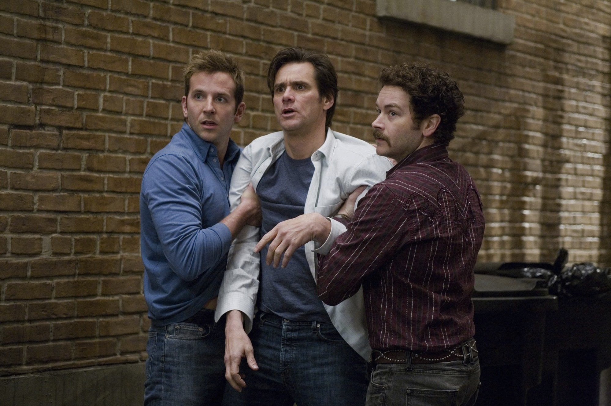 Still of Jim Carrey, Danny Masterson and Bradley Cooper in Yes Man (2008)