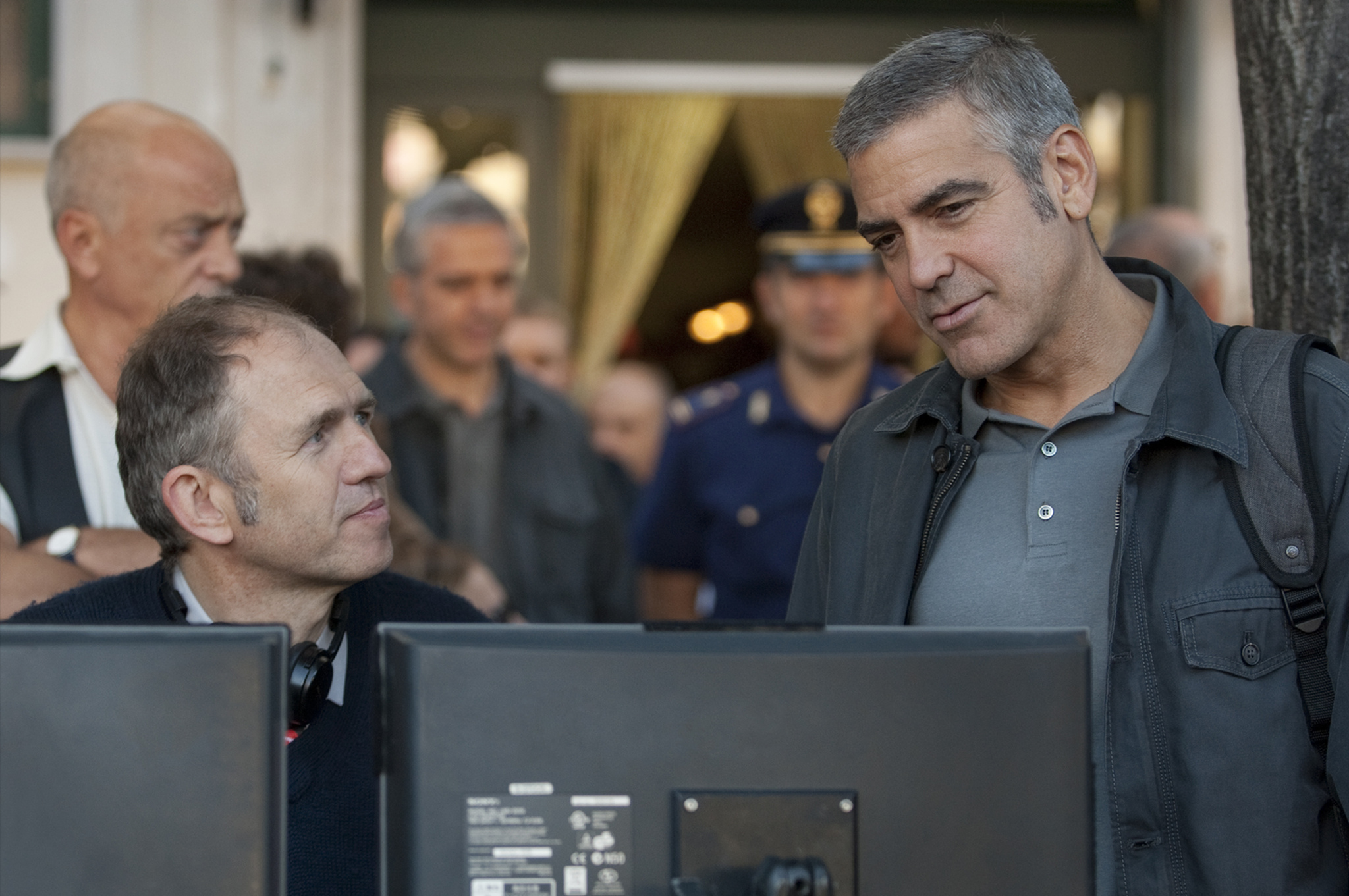 Still of George Clooney and Anton Corbijn in The American (2010)