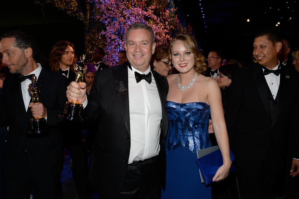 Neil Corbould, winner of Best Achievement in Visual Effects and Maria Pudlowska attend the Oscars Governors Ball at Hollywood & Highland Center on March 2, 2014 in Hollywood, California.