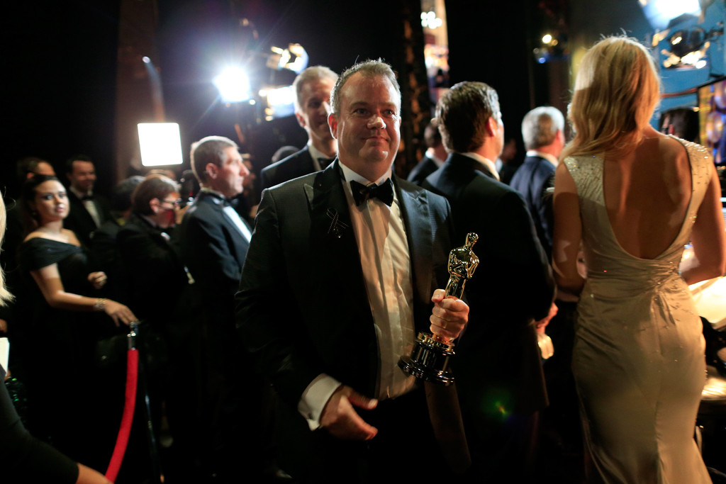Neil Corbould, backstage at Academy Awards with Oscar for GRAVITY