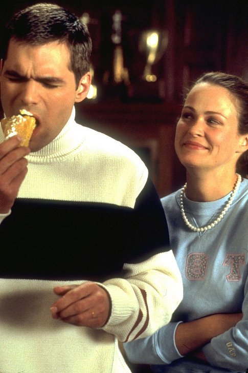 D.I.K. fraternity member Richard Bagg (DANIEL COSGROVE) and his eager assistant Jeannie (EMILY RUTHERFURD) enjoy an éclair, courtesy of Van Wilder