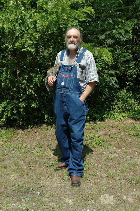 July 2006 Publicity Photo of Herbert Cowboy Coward, the toothless man from Deliverance. Shown here with his pet squirrell 