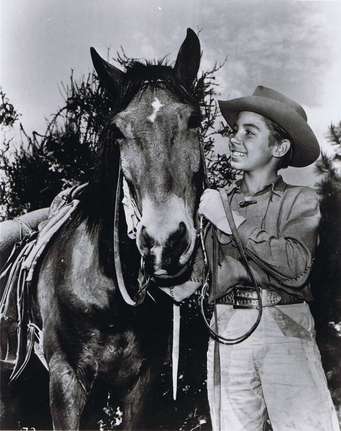 Mark McCain (Johnny Crawford) with his horse Blueboy (Bosco) during the first season of The Rifleman (1958-1959).