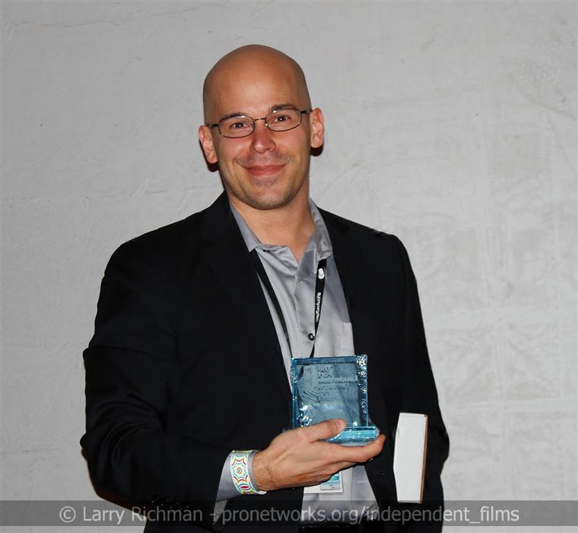 Brian Crewe accepts the award for Best American Short Film at the 2012 Fort Lauderdale Film Festival for his short film FAR
