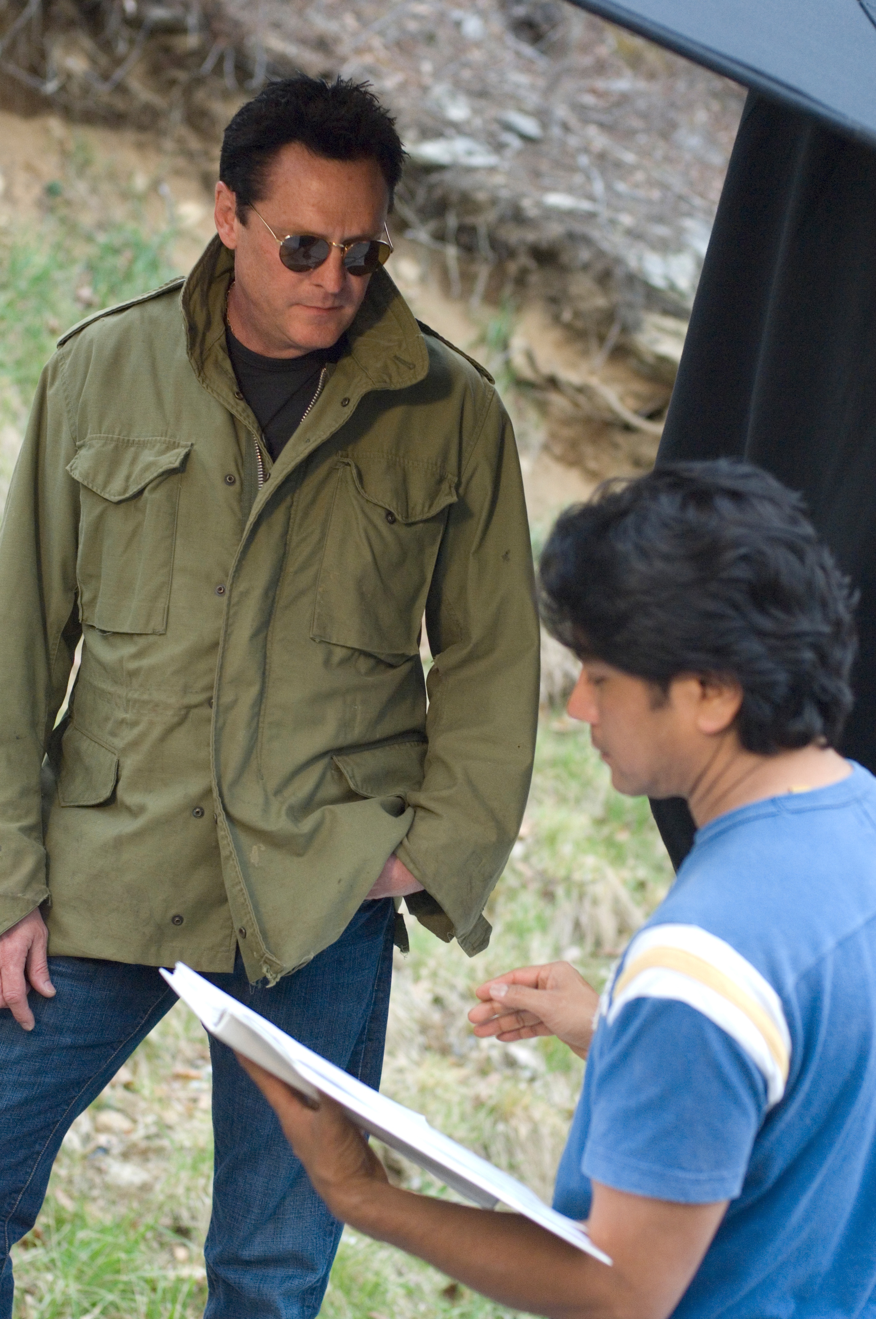 Ace Cruz directing Michael Madsen on the set of Outrage in Raben County, GA