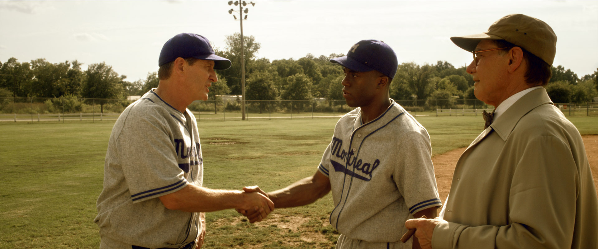 Still of Harrison Ford, Brett Cullen and Chadwick Boseman in 42 (2013)