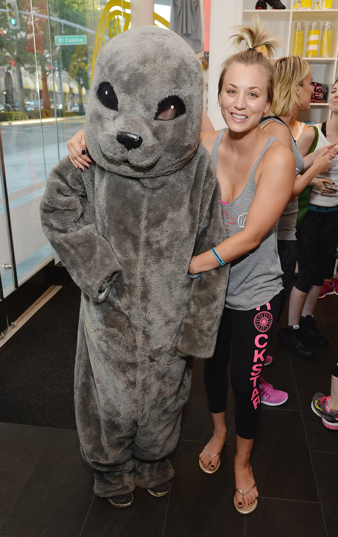 Actress Kaley Cuoco poses with Sammy the Seal at the launch of Wheels for Seals benefiting The Humane Society Of The United States at Soul Cycle Beverly Hills on June 23, 2014 in Beverly Hills, California.