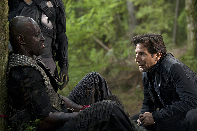 Still of Henry Ian Cusick and Colin Lawrence in The 100 (2014)