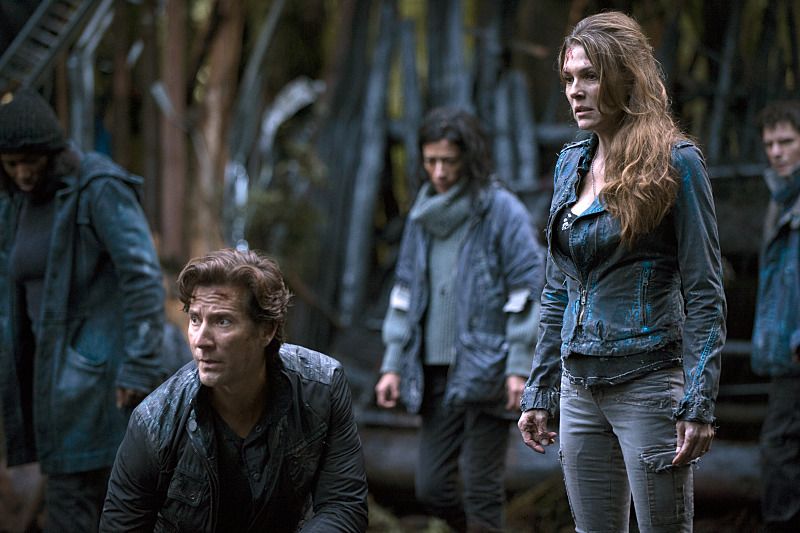 Still of Henry Ian Cusick and Paige Turco in The 100 (2014)