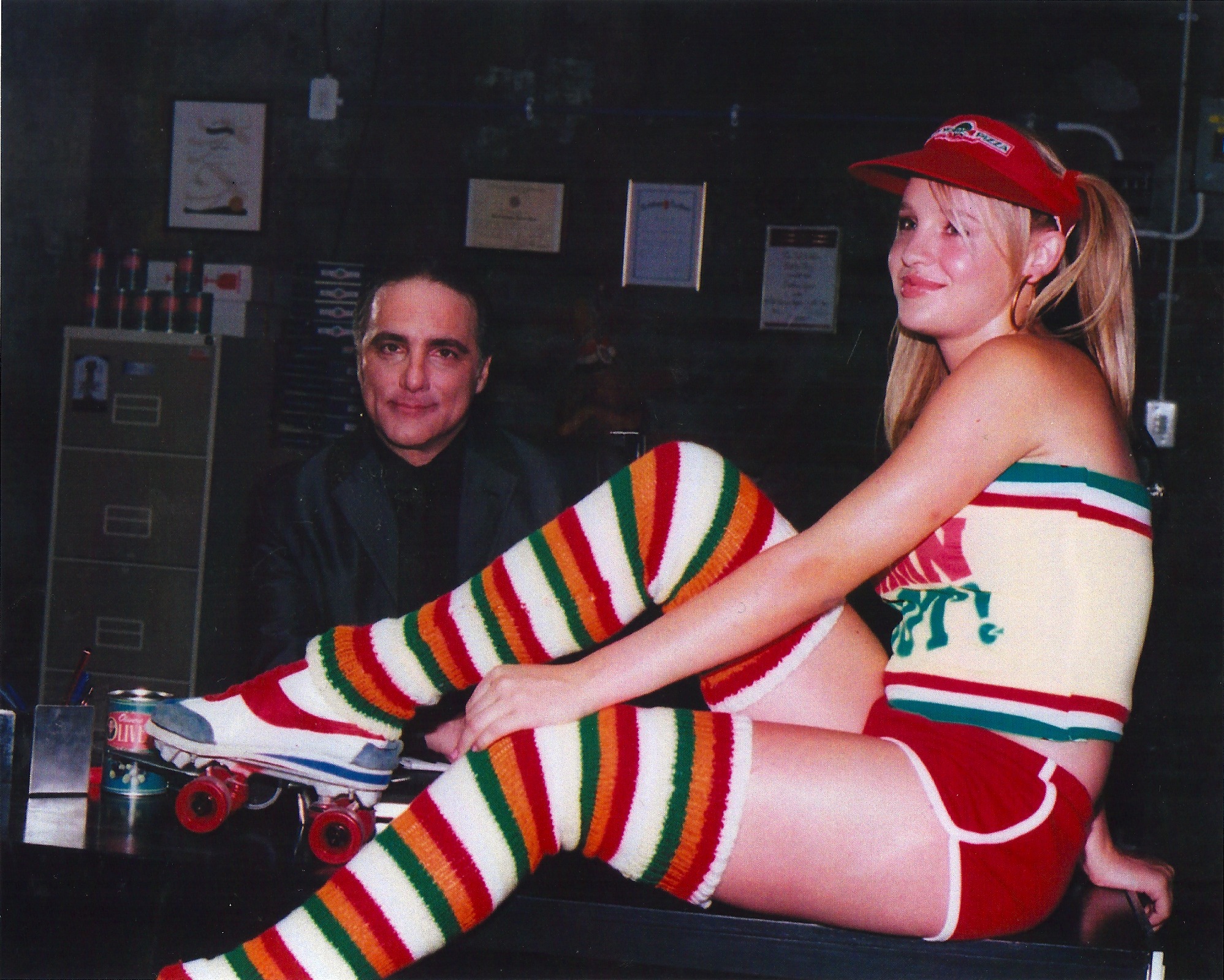 Actor Richard D'Alessandro in South Africa, shooting a Commercial for New York Pizza . The girl is the roller girl in the commercial . We do not have her name as of yet