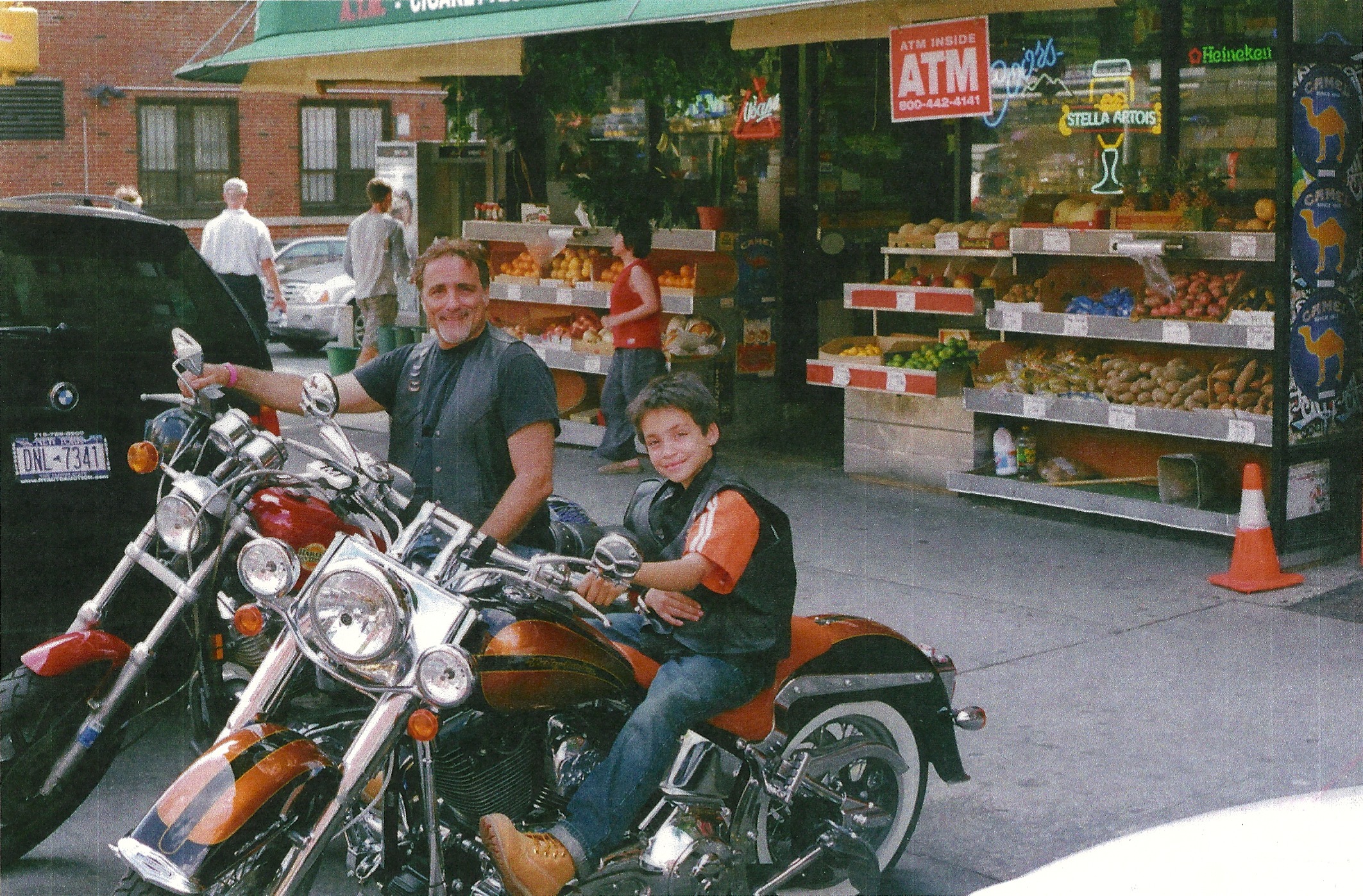 From left to right Richard D'Alessandro and his son Giancarlo resting up ,right before the 2010 NYC Harley Davidson Breast Cancer run .
