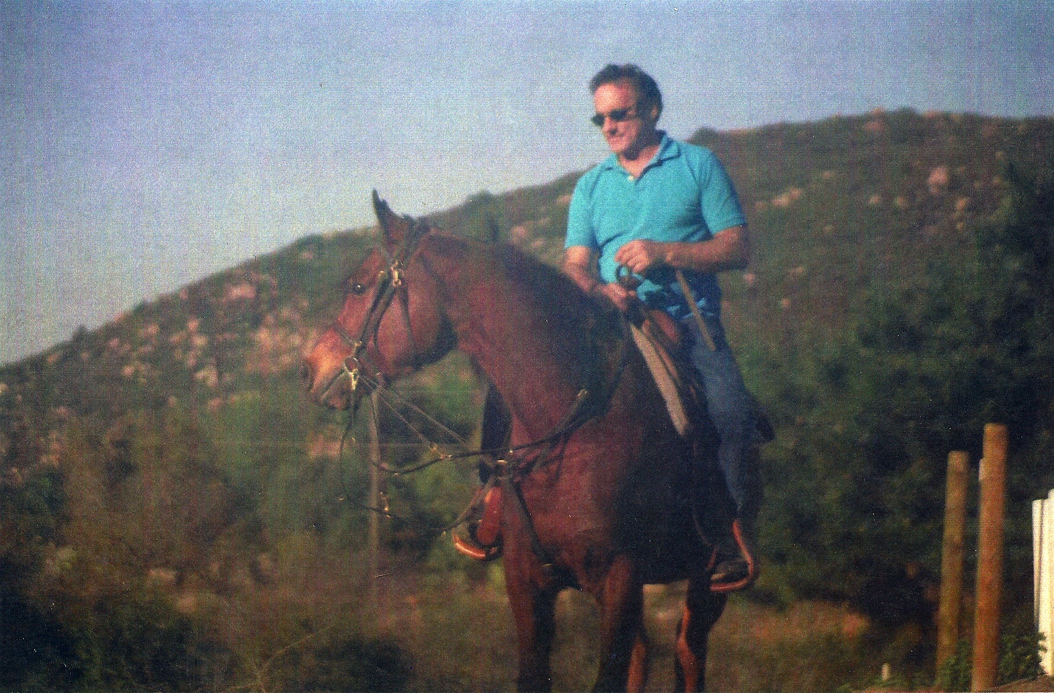 Richard D'Alessandro on his Arabian in the hills of Ca.He rides western and is pretty good with a rifle and pistol due to his Navel training and his friends he had in the NYPD and LAPD , who often took him to the gun range.
