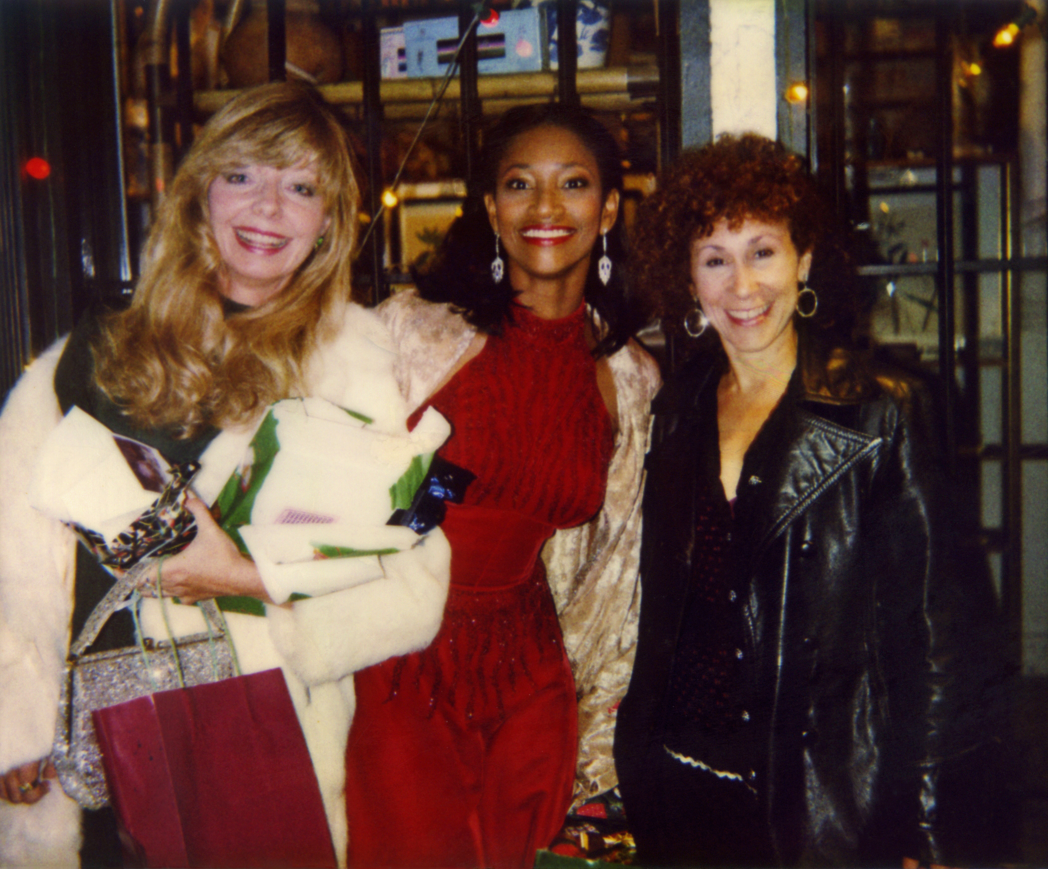 Grif Griffis, Pamella D'Pella and Rhea Perlman still from the final scene of 