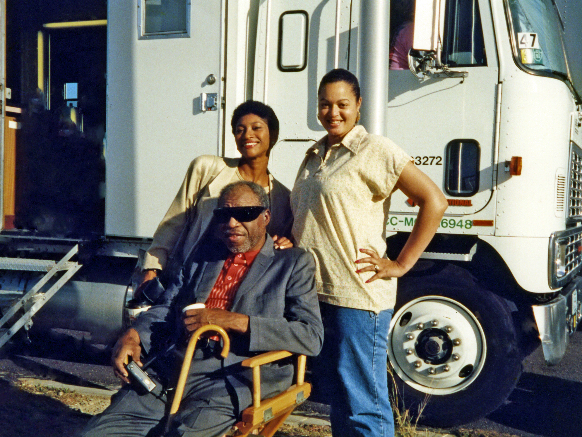 Pamella D'Pella, with Harry Caesar and his daughter, Jackie on the set of 