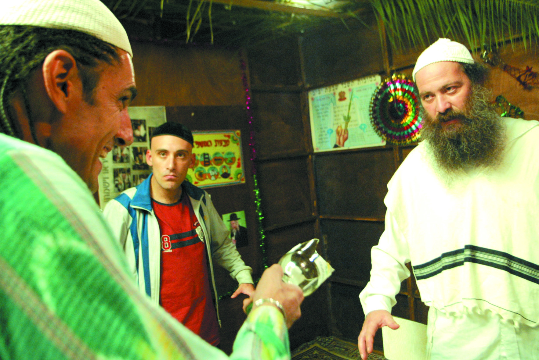 Shuli Rand, Shaul Mizrahi and Ilan Ganani in Ushpizin