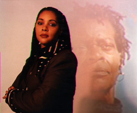 Director Julie Dash in frony of an image from her film 