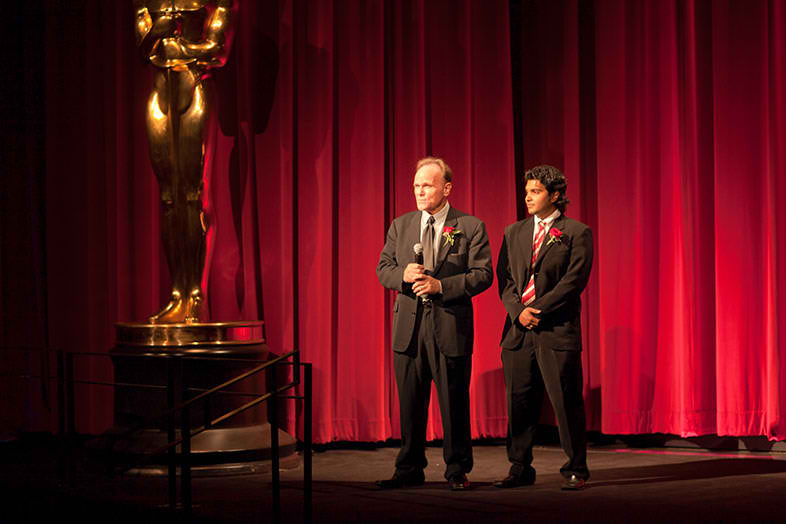 Producer BJ Davis and Director Asif Akbar addressing the audience on stage at the Academy of Motion Picture Arts and Sciences during the premiere of 