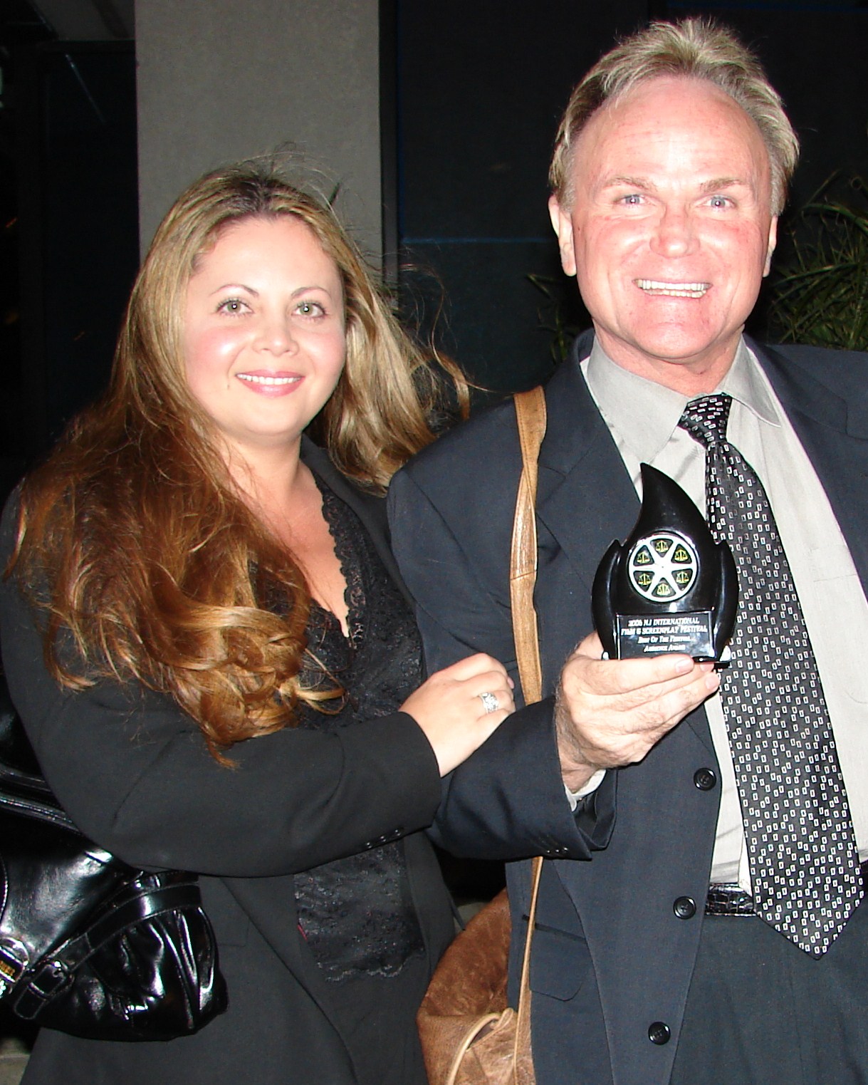 BJ Davis and Julia Davis receiving the Best Picture Award for the feature film 