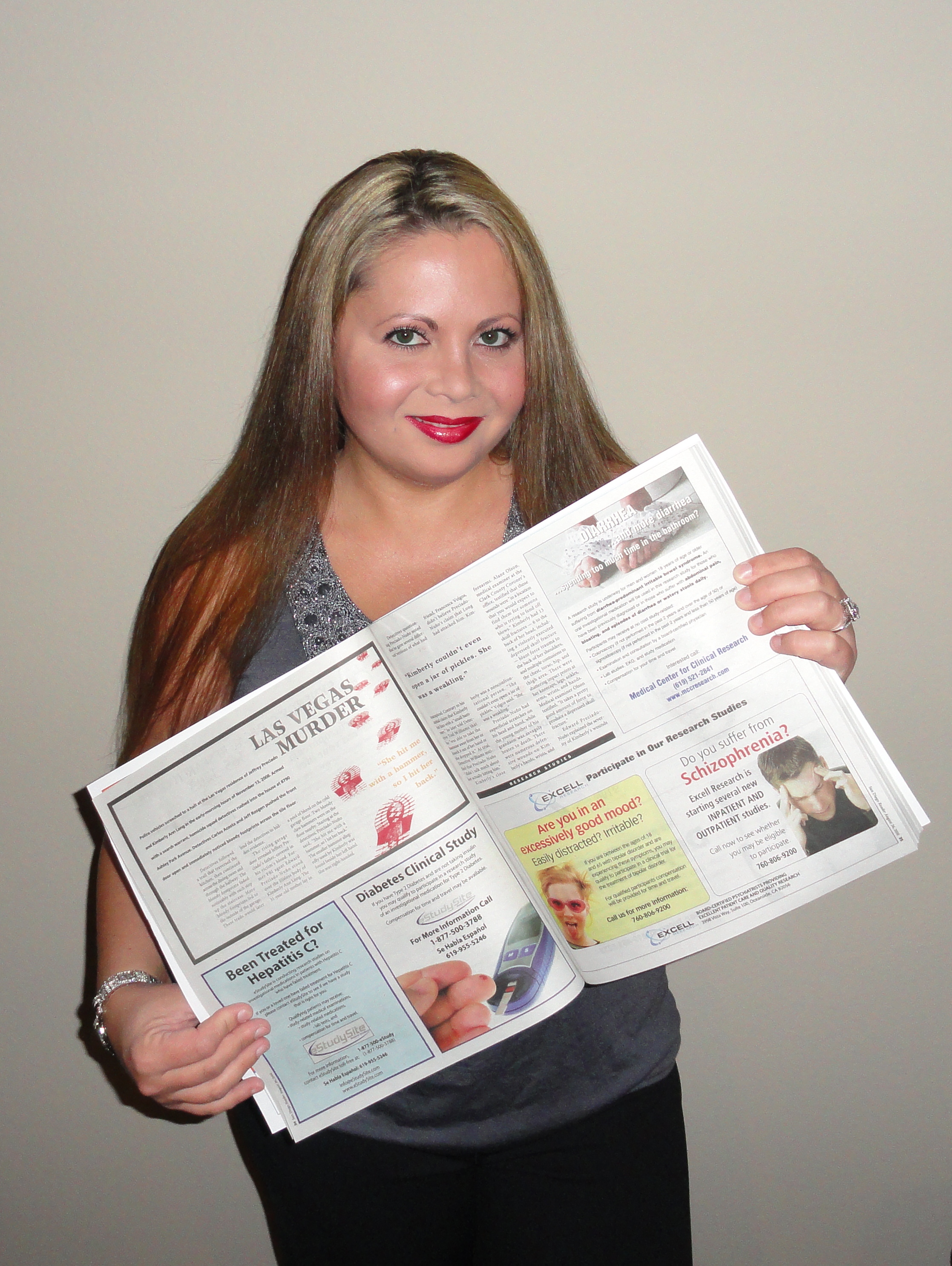 Julia Davis with her featured article in the San Diego Reader, 